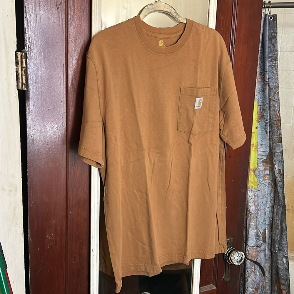 Brown carhartt shirt with front left side chest pocket brand new from looks new
